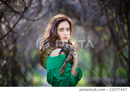 Attracrive girl with snake Attracrive girl with snake 22077447