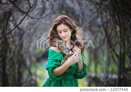 Attracrive girl with snake 22077448
