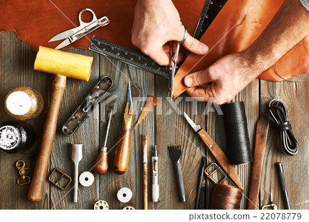 Man working with leather 22078779