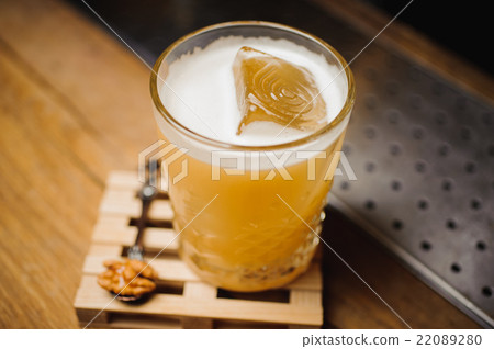 whiskey cocktail and natural ice on bar 22089280