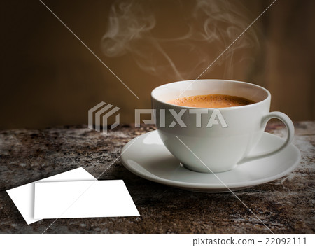 Cup of coffee with business card Cup of coffee with business card 22092111