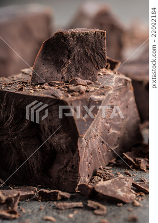 Chocolate. Black chocolate. A few cubes of black Chocolate. Black chocolate. A few cubes of black 22092184