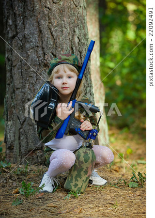 girl in camouflage suit with rifle girl in camouflage suit with rifle 22092491