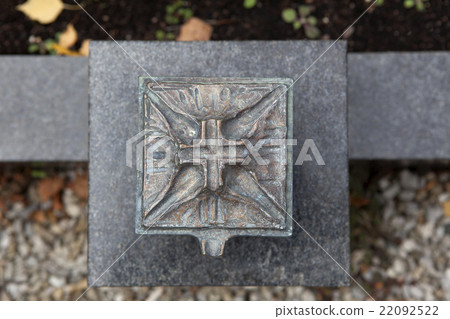 Holy water shell at the grave Holy water shell at the grave 22092522