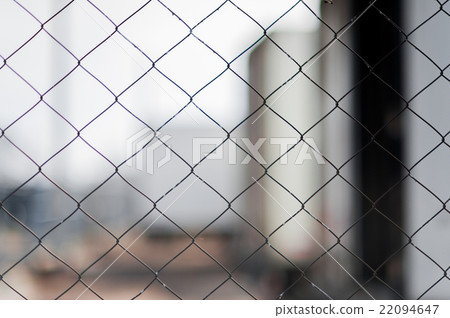Security with a barbed wire fence Security with a barbed wire fence 22094647