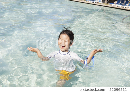 Children playing in the pool Children playing in the pool 22096211