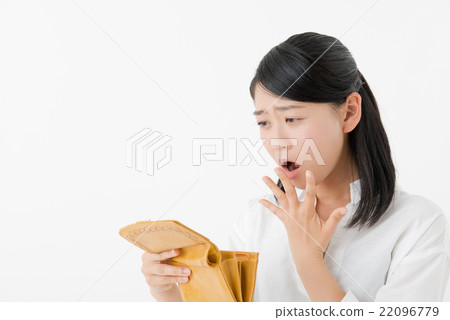 A woman holding a wallet A woman holding a wallet 22096779