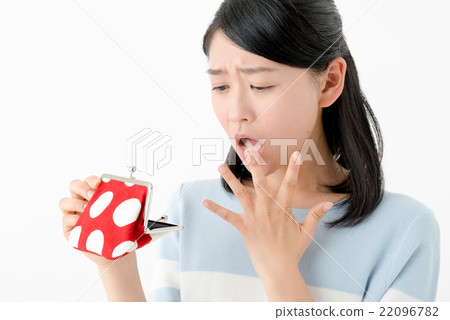 A woman holding a wallet A woman holding a wallet 22096782