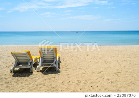 Beach chairs on White Sand Beach with blue sky Beach chairs on White Sand Beach with blue sky 22097076