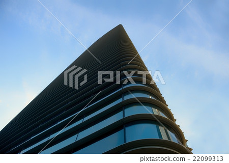 Skyscrapers against blue sky 22099313