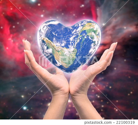 World in heart shape with over women human hands 22100319