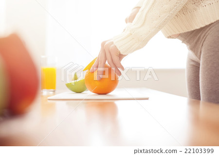 Pretty expectant mother prefers healthy eating Pretty expectant mother prefers healthy eating 22103399
