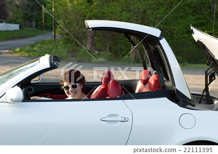 Woman Putting the Top Down 22111395