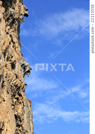 rock wall under blue sky 22113556