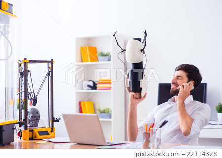 Handsome smiling man holding model printed on 3d 22114328