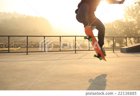 skateboarding woman at sunrise skatepark skateboarding woman at sunrise skatepark 22116885