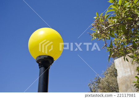 Yellow lampost in a street Yellow lampost in a street 22117081
