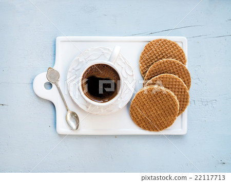 Dutch caramel stroopwafels and cup of black coffee Dutch caramel stroopwafels and cup of black coffee 22117713