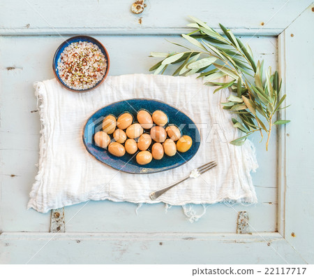 Green big olives in rustic ceramic plate with tree 22117717