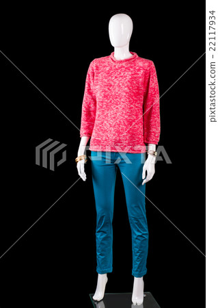 Pink pullover with tuquoise pants. 22117934