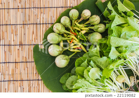 true vegetable on leaf and bamboo blind floor 22119082