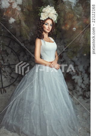 Woman with flowers on her head. Woman with flowers on her head. 22122168