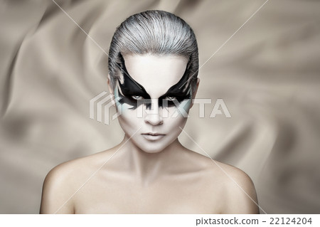 Close portrait of a girl with pattern. 22124204