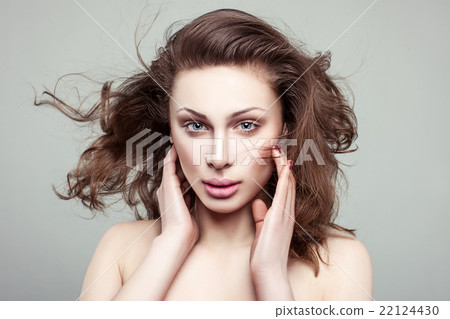 Portrait of a girl with minimal makeup. 22124430