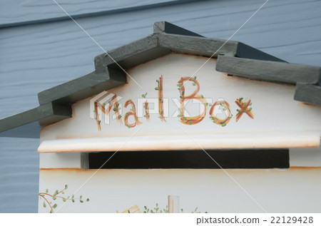mailbox with green wood background 22129428