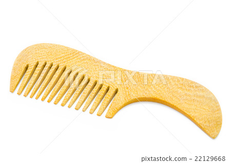 Wooden comb on a white. Wooden comb on a white. 22129668