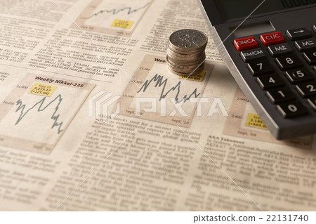 Newspaper stock market with calculator and money Newspaper stock market with calculator and money 22131740