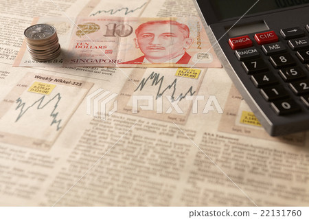 Newspaper stock market with calculator and money Newspaper stock market with calculator and money 22131760