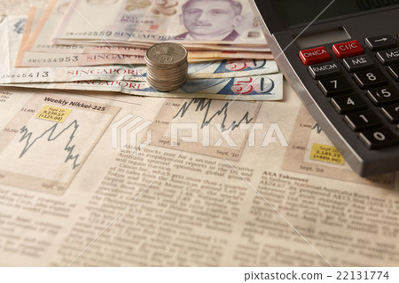 Newspaper stock market with calculator and money 22131774
