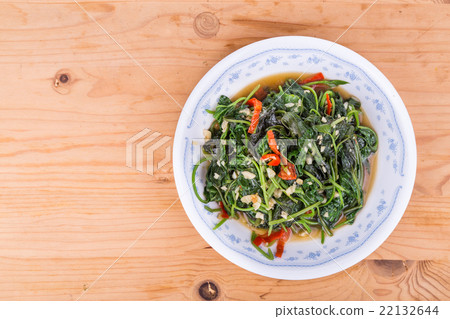 Plate of fried sweet potato leafs, Asian delicacy Plate of fried sweet potato leafs, Asian delicacy 22132644