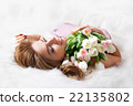 Woman with a bouquet of flowers. Woman with a bouquet of flowers. 22135802