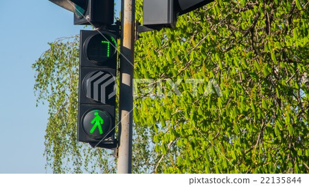Traffic lights with the green light lit Traffic lights with the green light lit 22135844