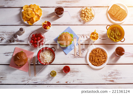 Burger and sauerkraut with drink. 22136124