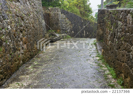 The old road wet with rain, the cobbled street of Shuri Kinjo Town, Okinawa 22137366