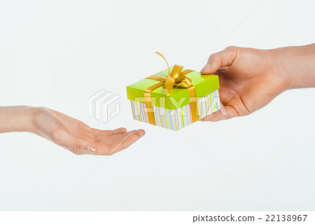 Nice photo of two hands with gift 22138967