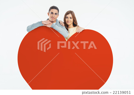 Couple near big red heart Couple near big red heart 22139051