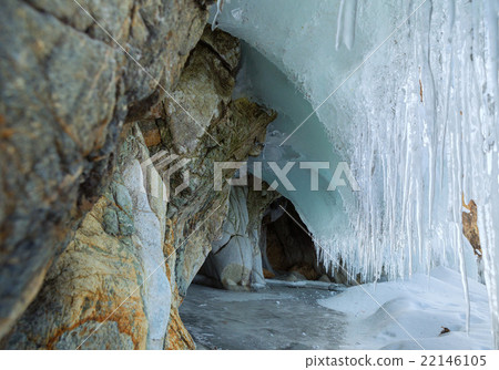 Multicolored stone grotto with icicles. Multicolored stone grotto with icicles. 22146105