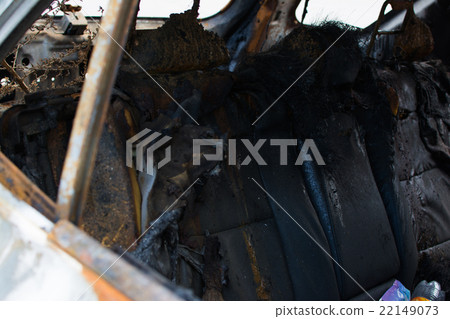 Burned gray car. 22149073