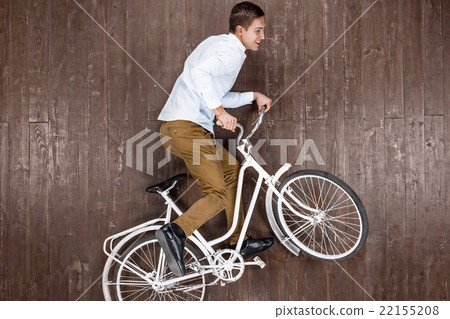 Top view photo of man on wooden floor Top view photo of man on wooden floor 22155208