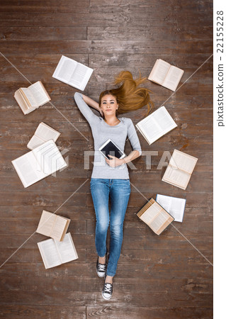 Top view photo of girl on wooden floor Top view photo of girl on wooden floor 22155228