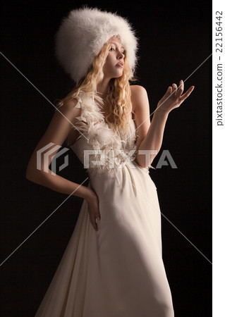 The beautiful young woman in a wedding dress 22156442
