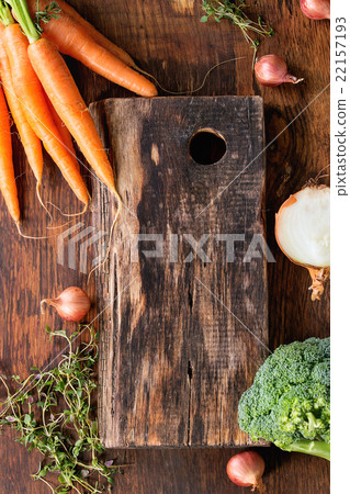 Wooden background with vegetables Wooden background with vegetables 22157193