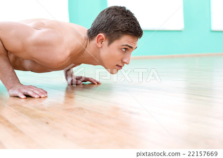 Fitness boy in sport club Fitness boy in sport club 22157669