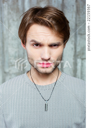 Studio shot of young stylish man Studio shot of young stylish man 22159367