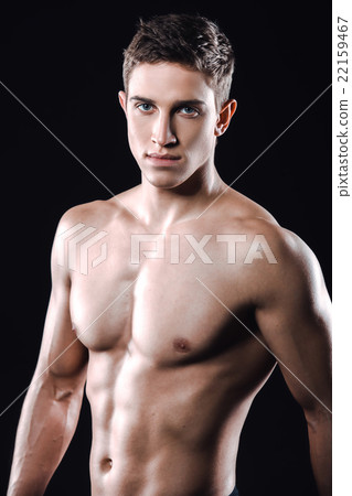 Fitness boy on black background 22159467