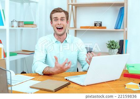 IT programmer working with laptop 22159836